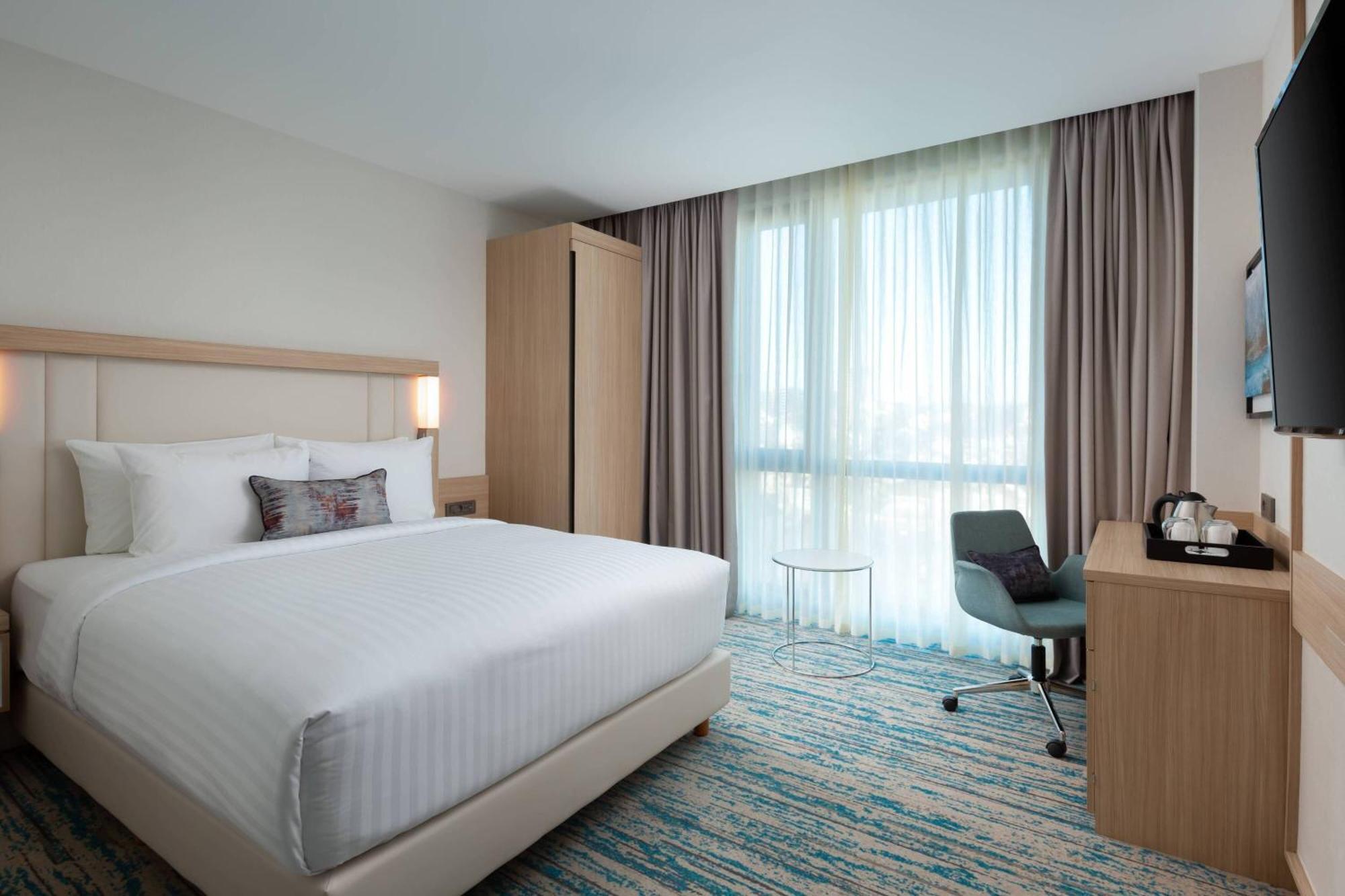 Standard Zimmer mit 1 Queensize-Bett und Stadtblick